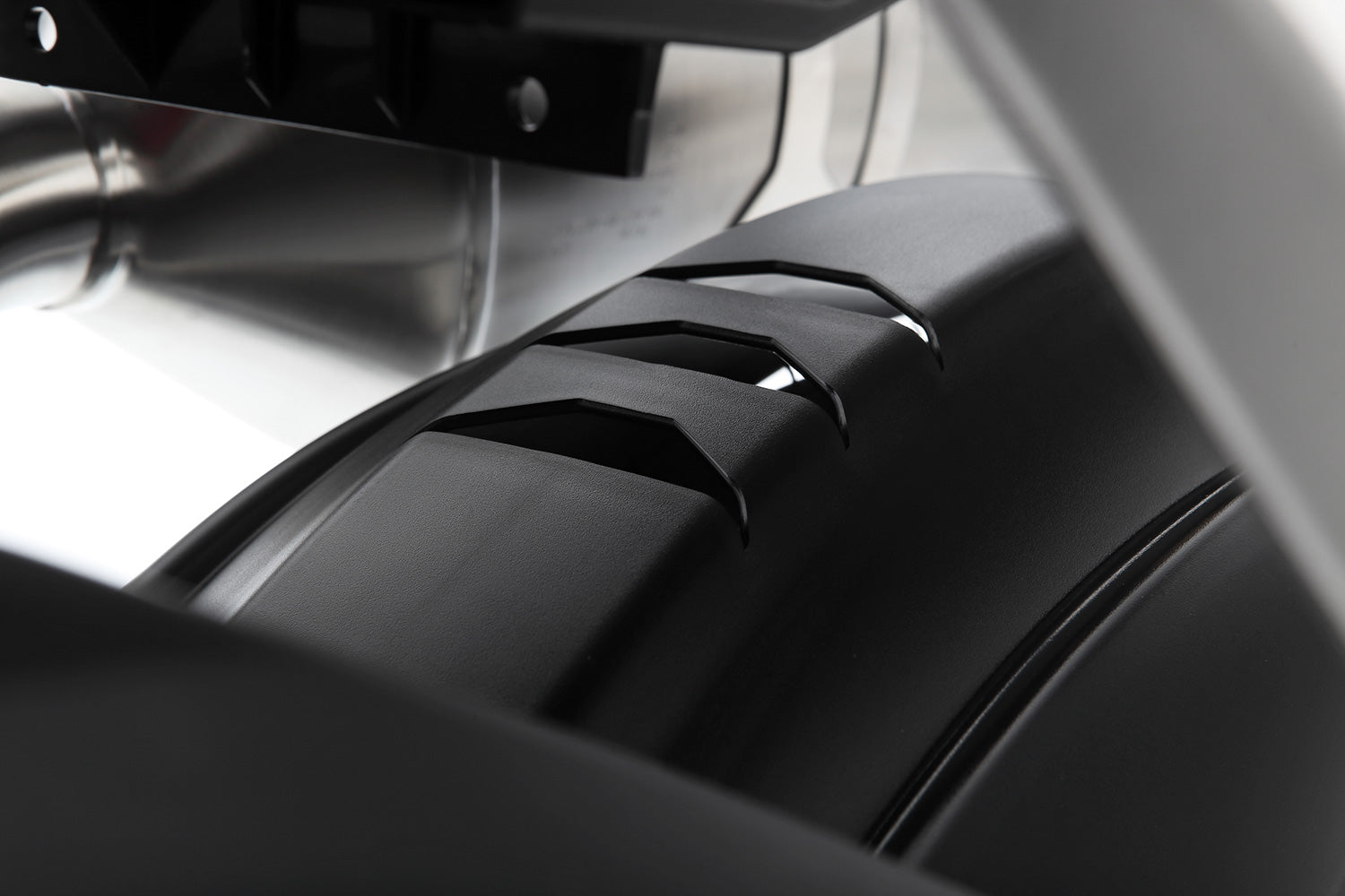 This rear hugger protects both man and machine!