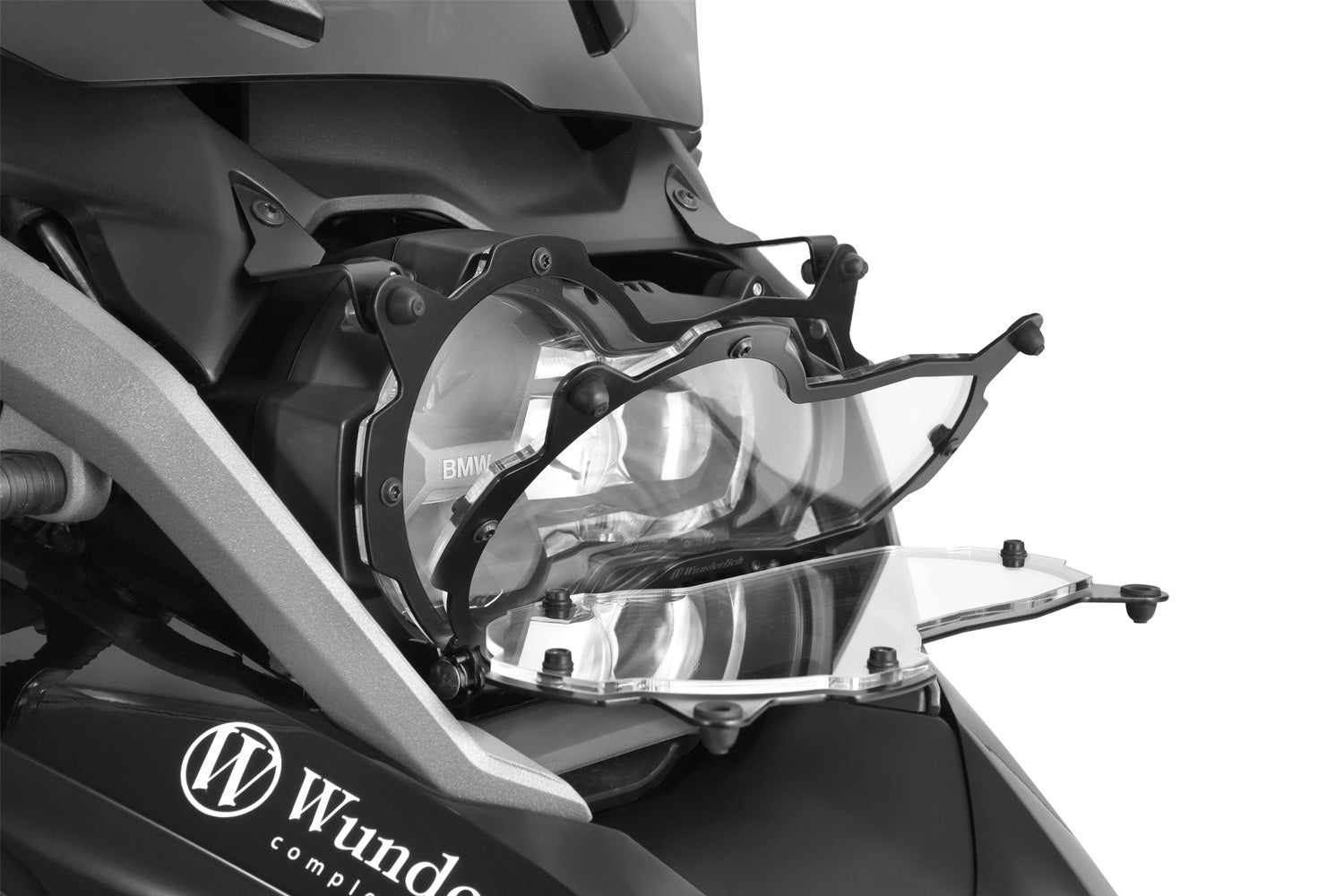 Foldable head light grille from Wunderlich provides effective protection for your bmw R 1200/1250 GS LC Adv. headlight protection.