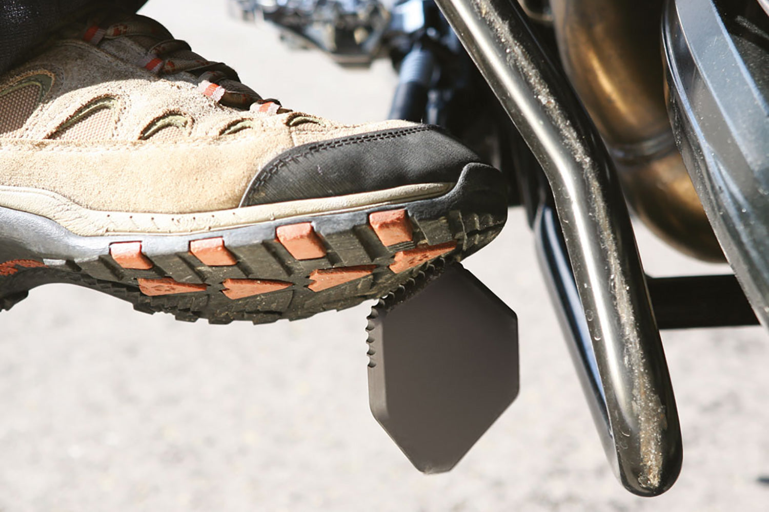 A precisely machined extension plate that can quickly be bolted to the side stand eliminates this risk.