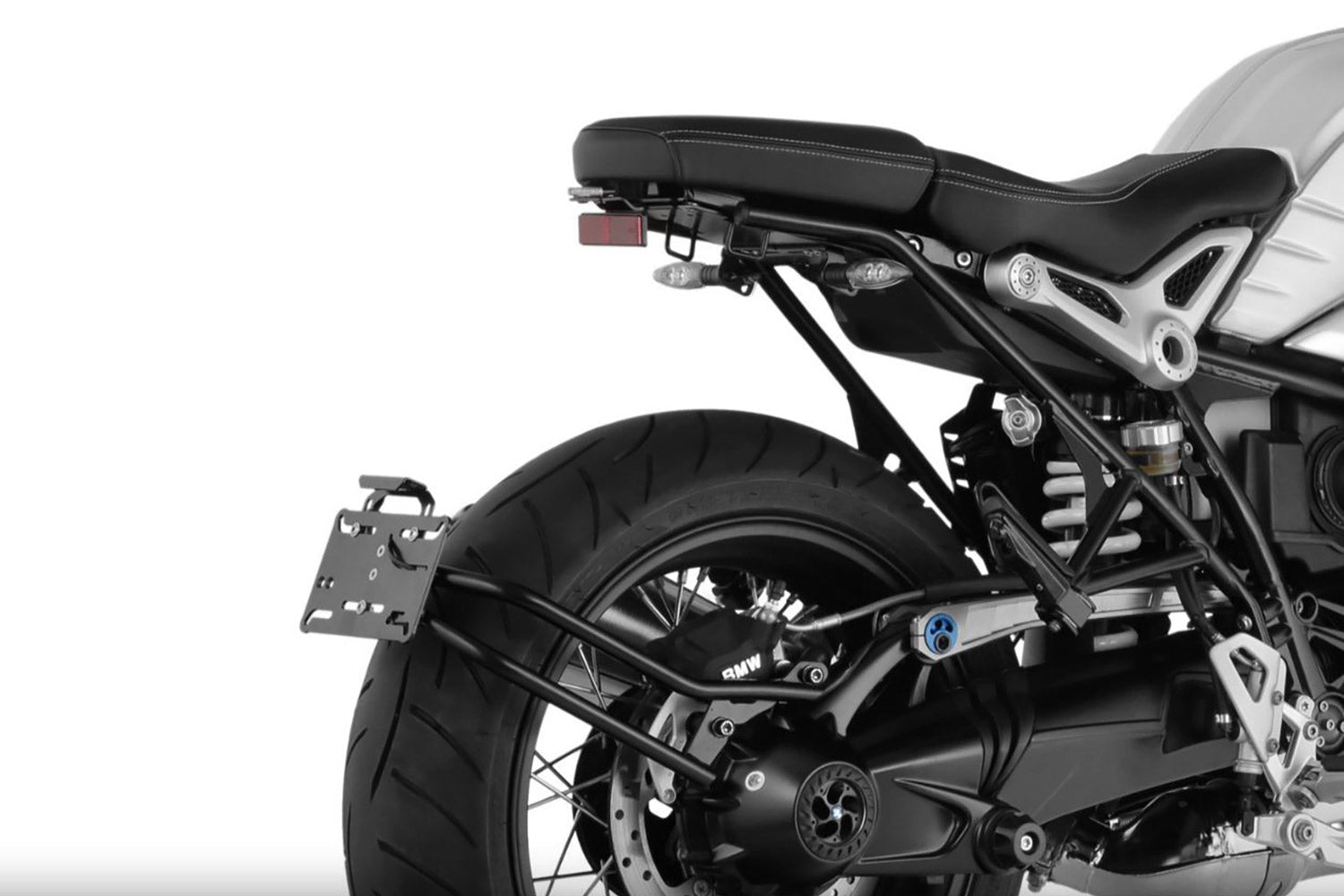 Discretely and lightweight number plate holder which integrates excellent into the sporty line of the Roadster