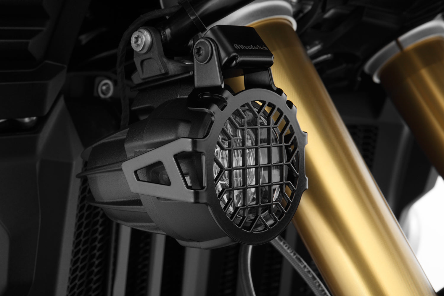 Wunderlich auxiliary light protection grille for BMW R 1200 GS LC protects even from violent impacts.