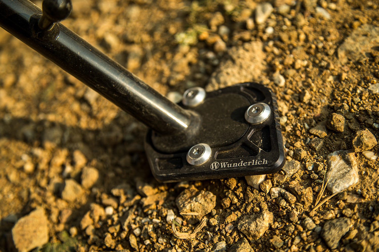 A precisely machined extension plate that can quickly be bolted to the side stand eliminates this risk.