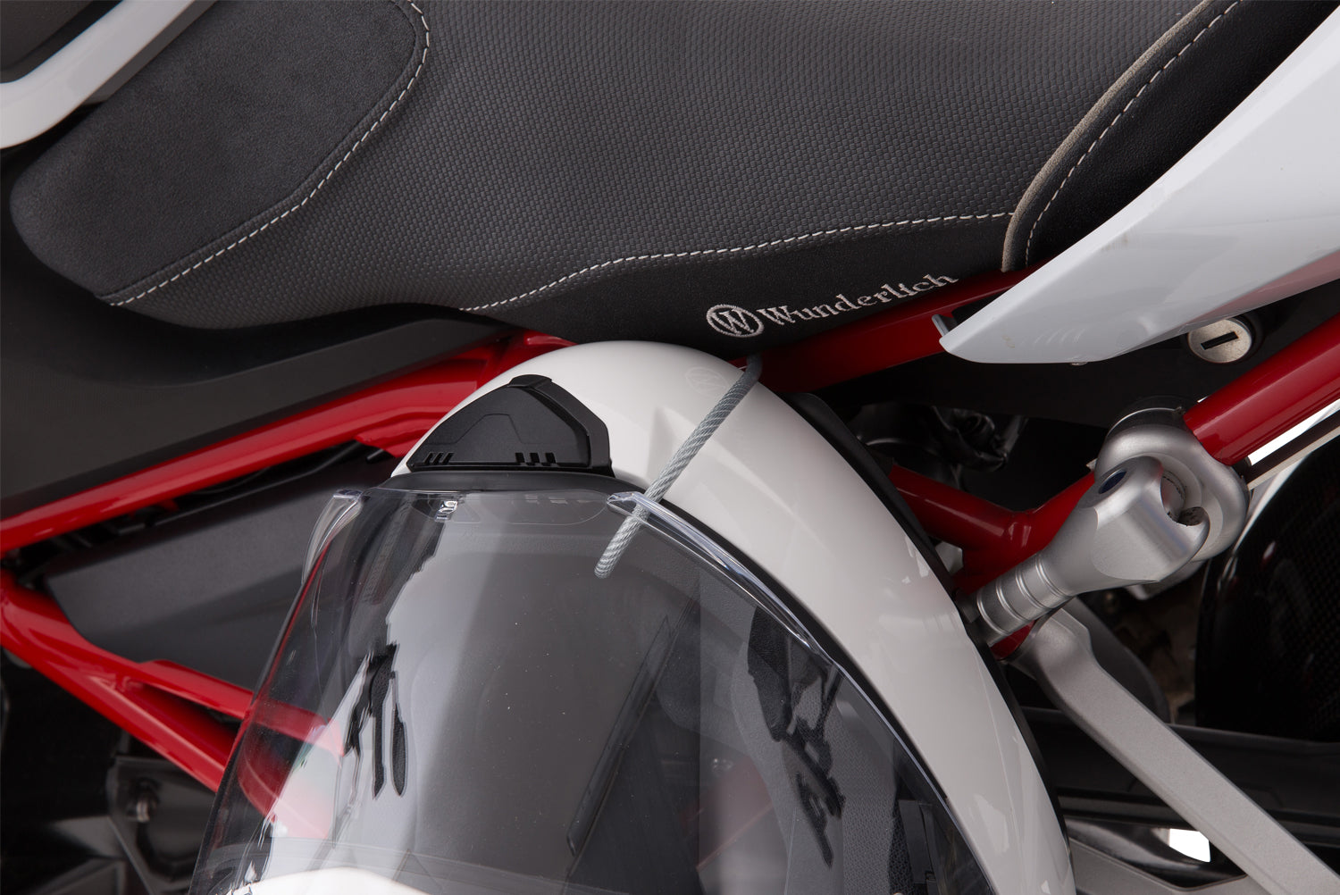 Wunderlich helmet anti-theft system „HelmLock“. The safest helmet protection.