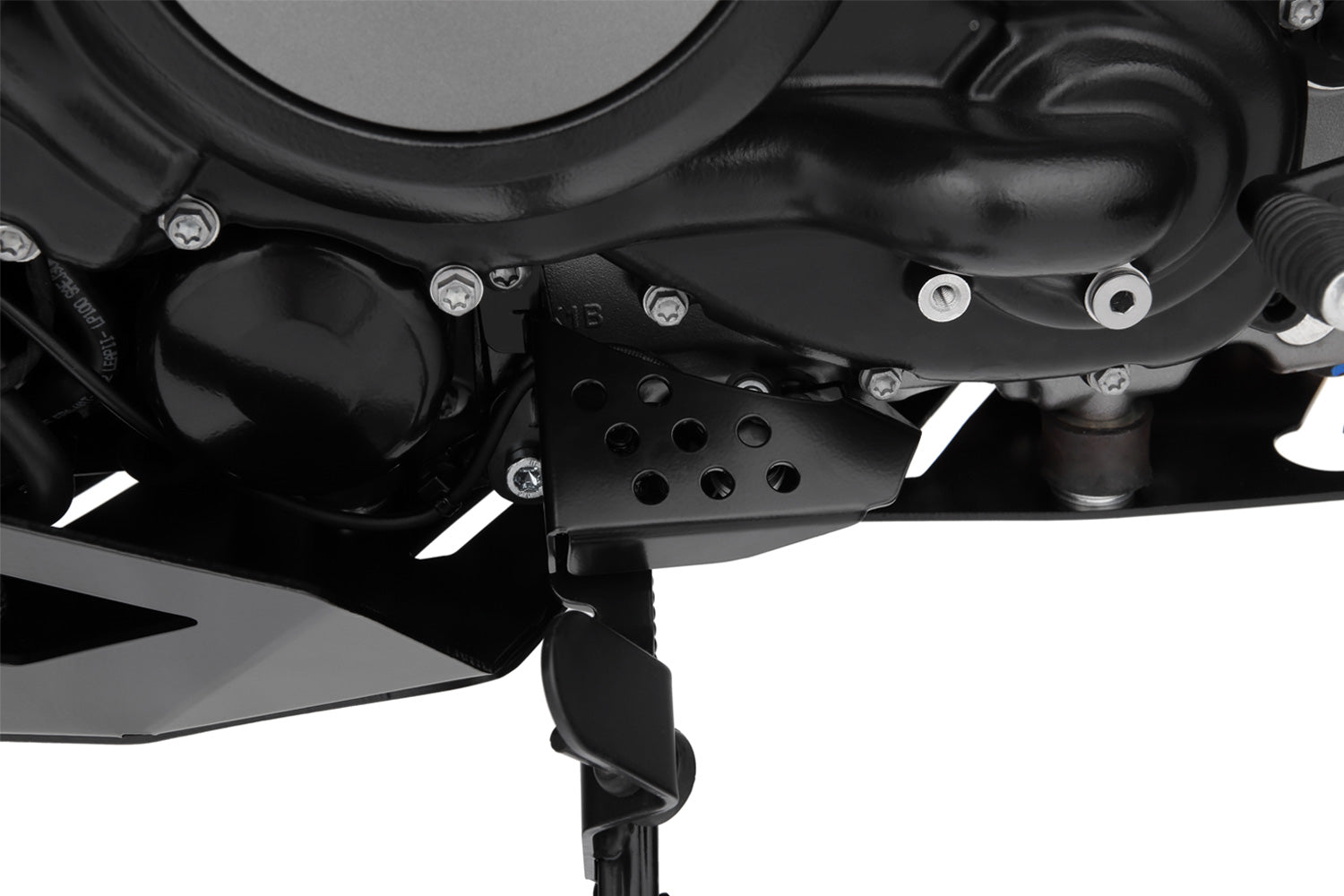 Solid all-round protection for the exposed ignition interruption switch on the side stand.