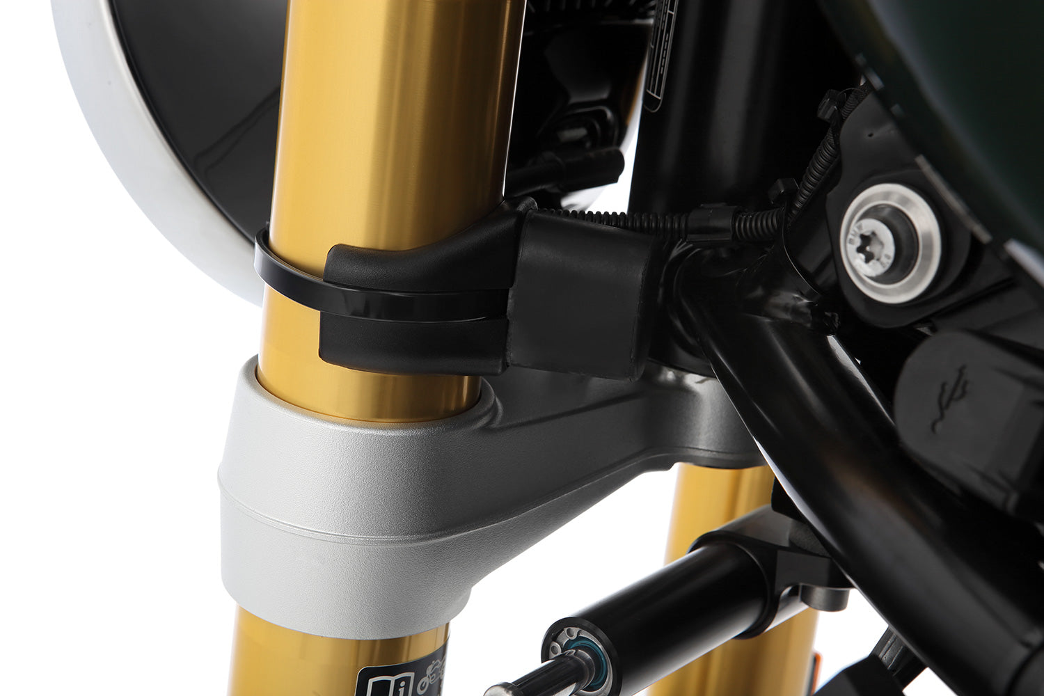 Limit and dampen the steering angle in the event of a fall, even before the standard steering stops are reached with full force