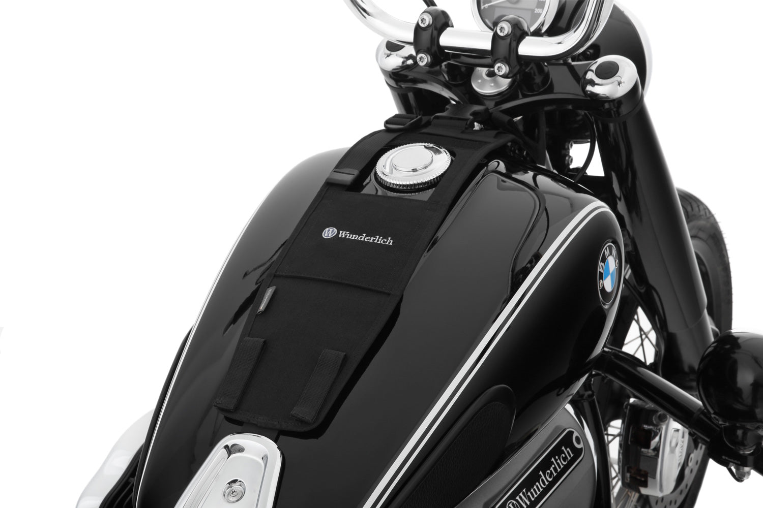 The mounting system is attached to the vehicle with minimal hand pressure and the tank bag can be quickly fastened to it. 