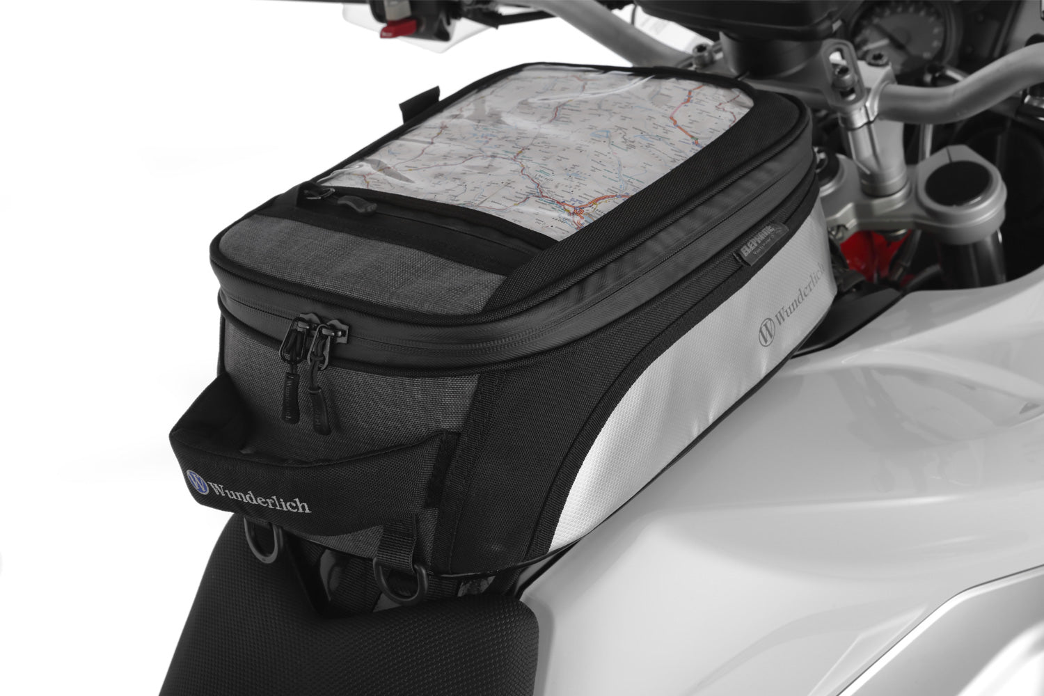 The mounting system is attached to the vehicle with minimal hand pressure and the tank bag can be quickly fastened to it. 