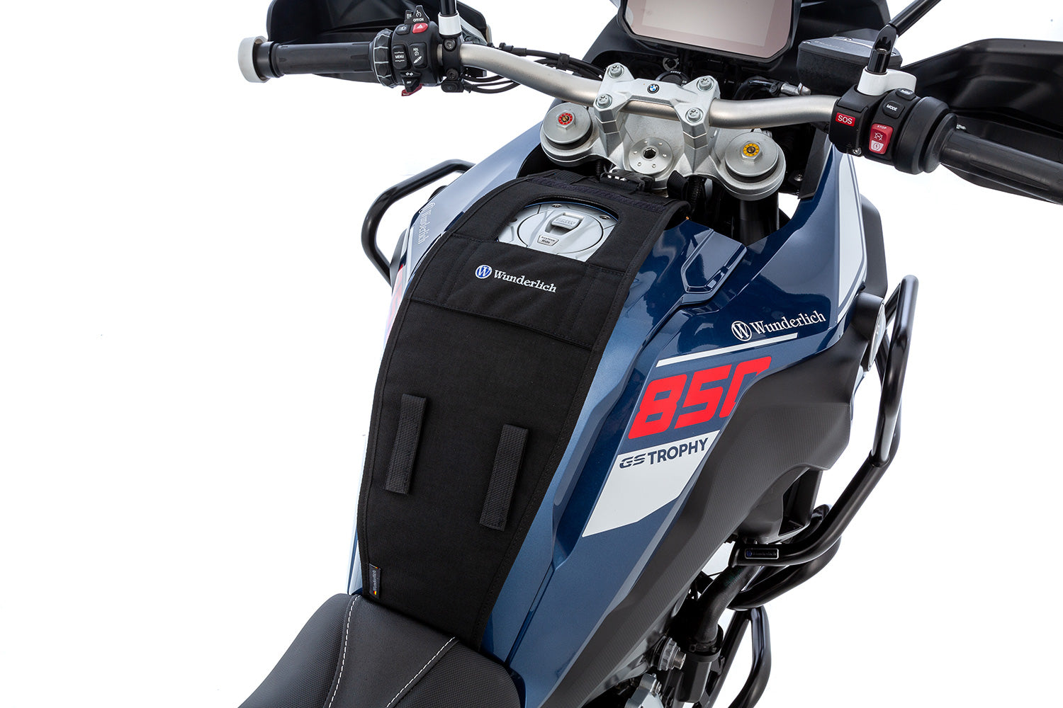 The mounting system is attached to the vehicle with minimal hand pressure and the tank bag can be quickly fastened to it. 