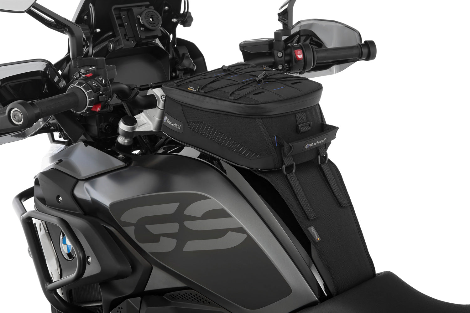 The mounting system is attached to the vehicle with minimal hand pressure and the tank bag can be quickly fastened to it. 
