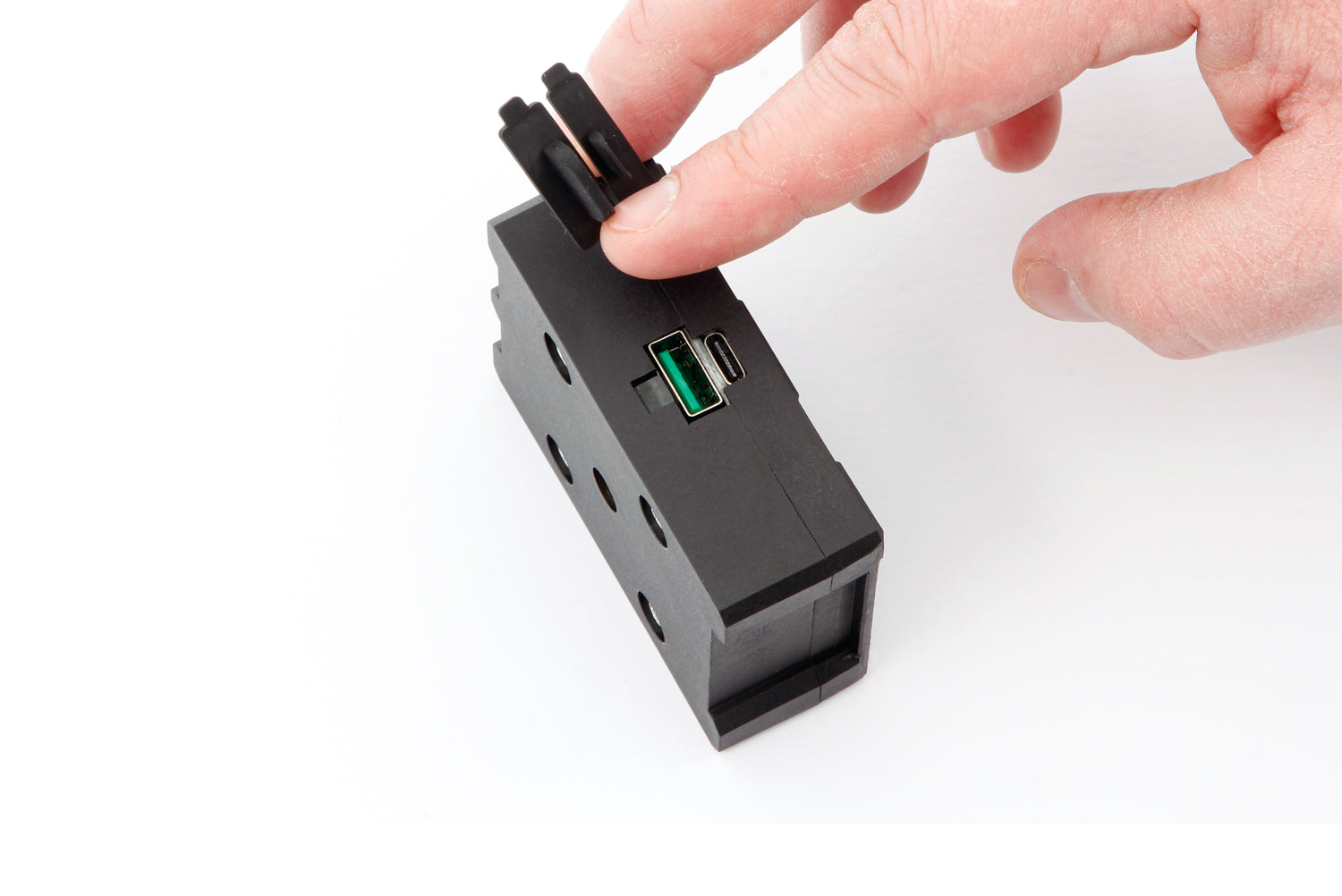 Our thoroughly practical USB charging box  fits all BMWs with the factory-side BMW navigation preparation (Navigator V,  VI).