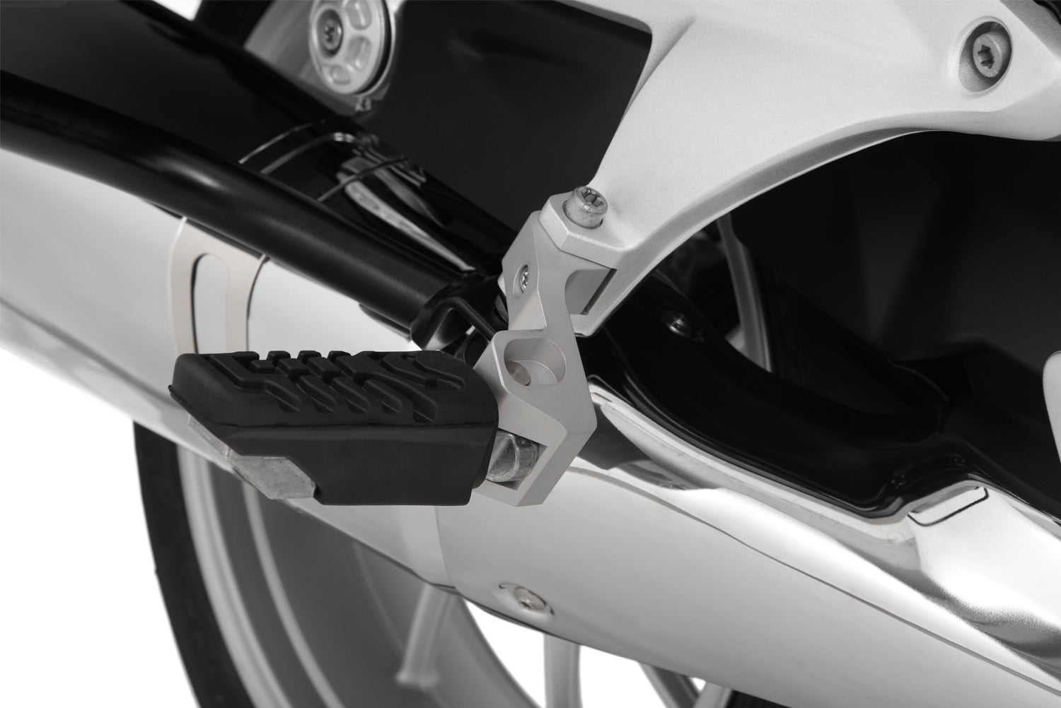 ERGO passenger Footrest lowering for R1200RT/LC offers a relaxed seating position and reduced the knee angle. Machined from solid aluminium.
