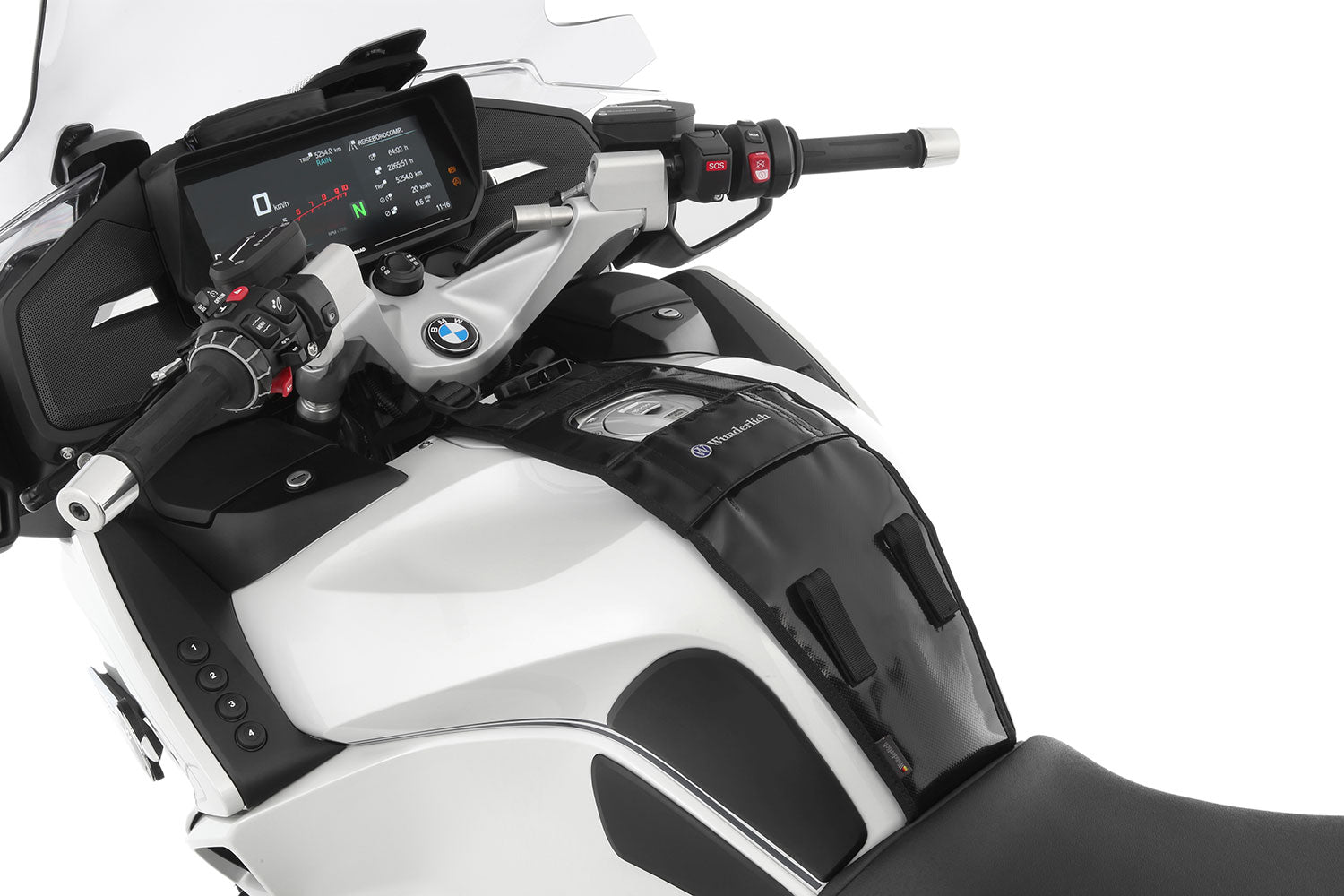 The mounting system is attached to the vehicle with minimal hand pressure and the tank bag can be quickly fastened to it. 