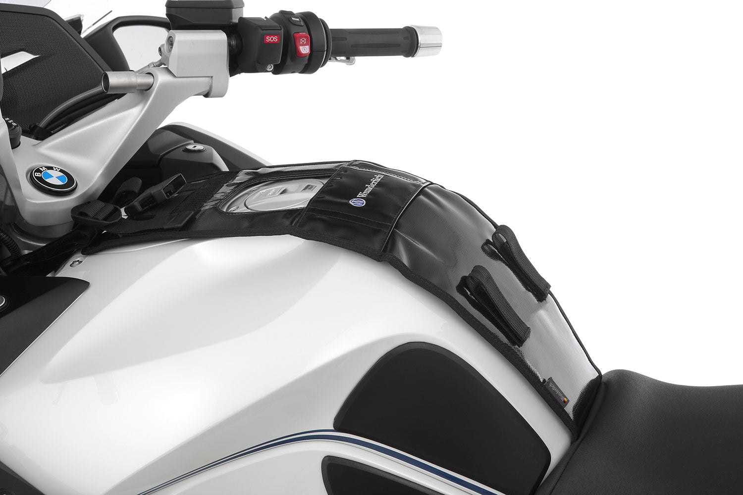 The mounting system is attached to the vehicle with minimal hand pressure and the tank bag can be quickly fastened to it. 