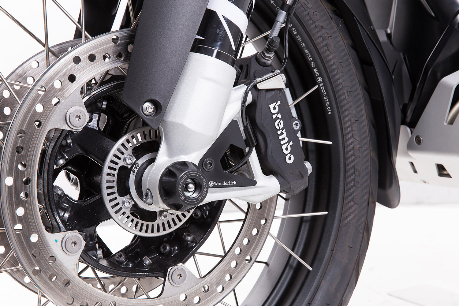 Wunderlich ABS sensor protection; this ABS sensor cover closes the gaps between the brake calliper and front wheel bearings.
