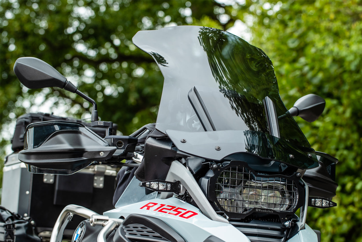 Wunderlich windshield »MARATHON« with Screen reinforcement  on both sides provides incomparable comfort when touring