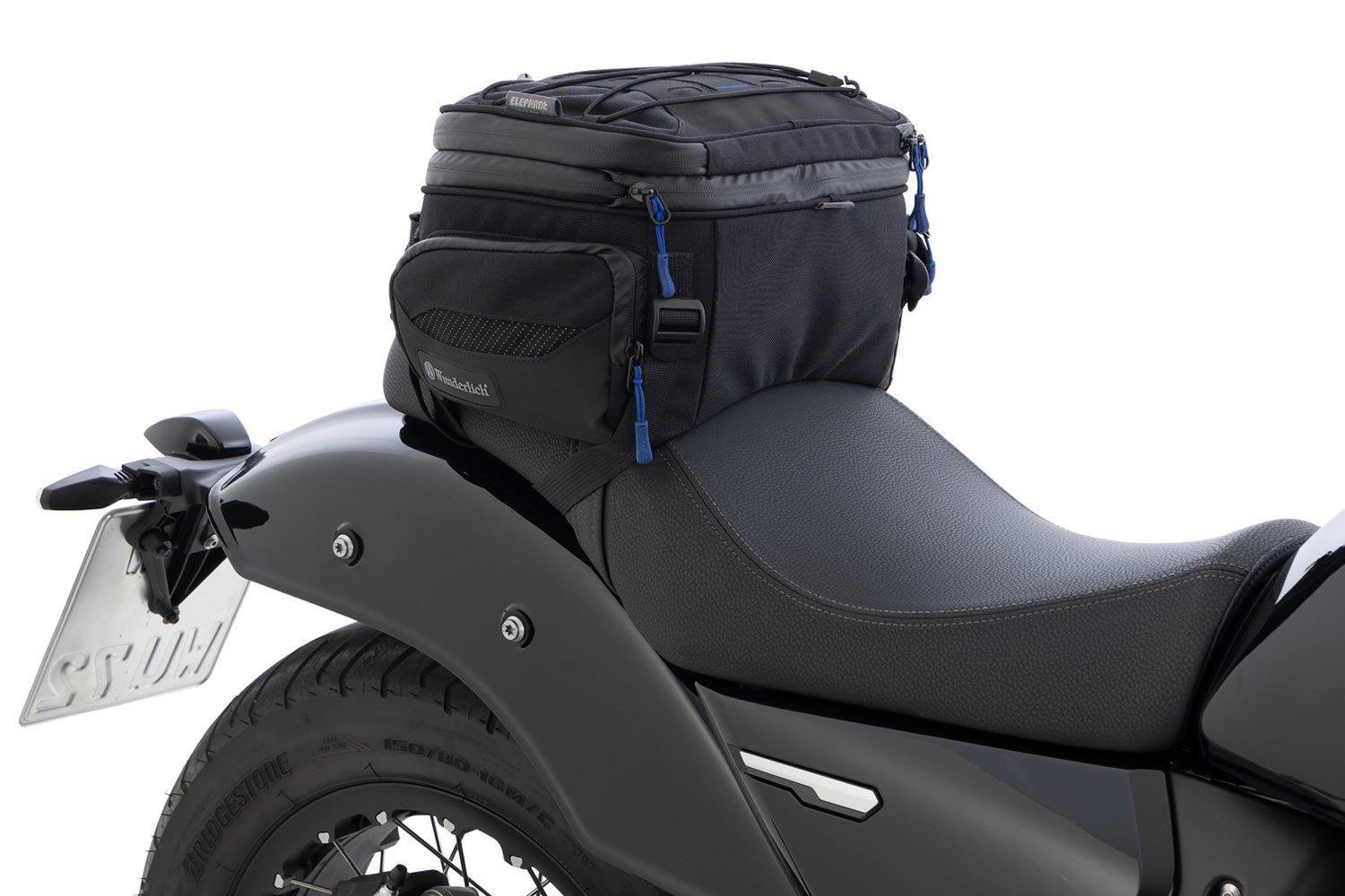 Multifunctional compact bag for the seat or luggage carrier