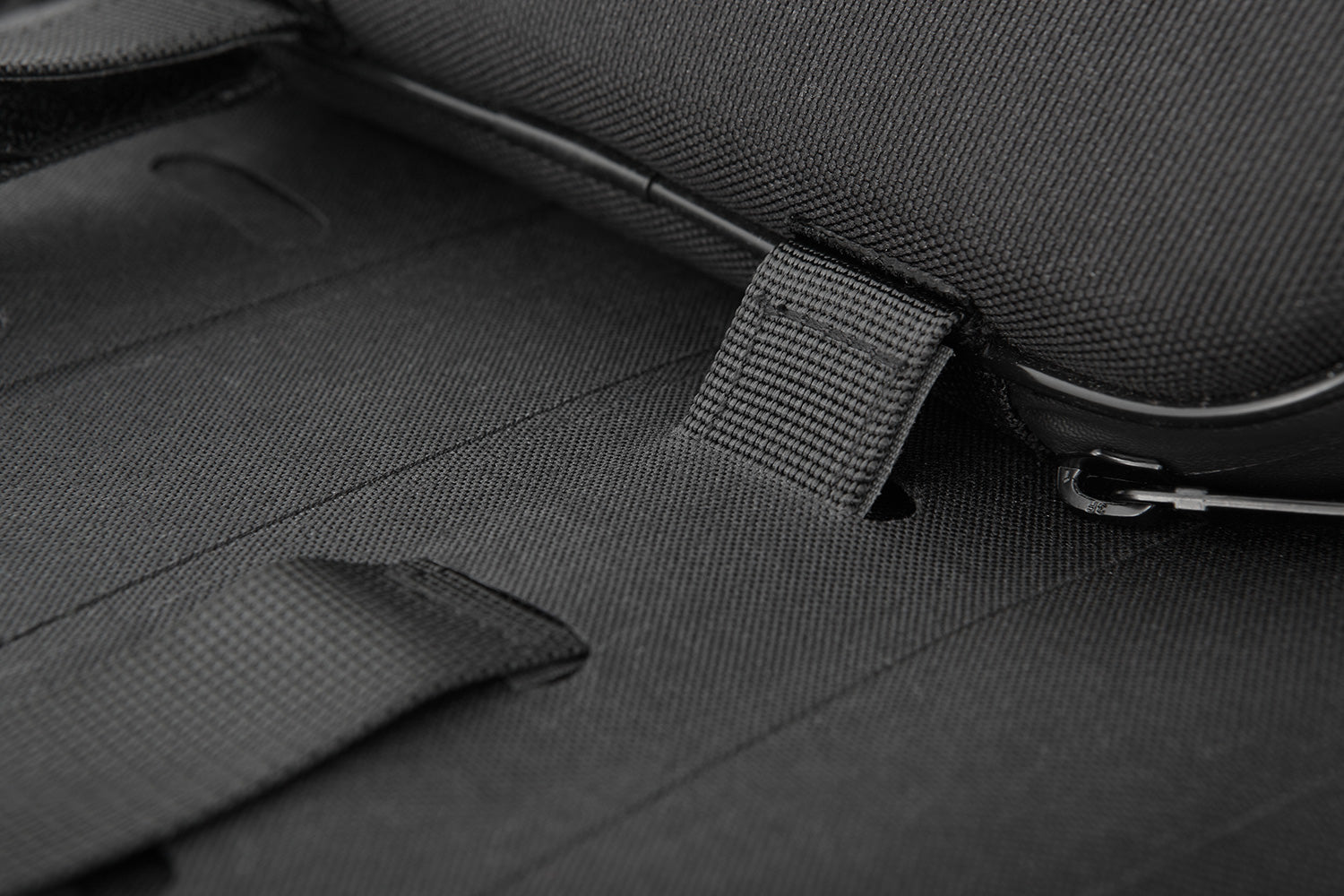 Multi-functional and compact bag can  either be attached to the luggage carrier of the passenger seat quickly and  simply