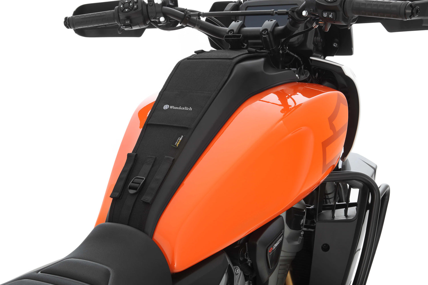 The mounting system is attached to the vehicle with minimal hand pressure and the tank bag can be quickly fastened to it. 